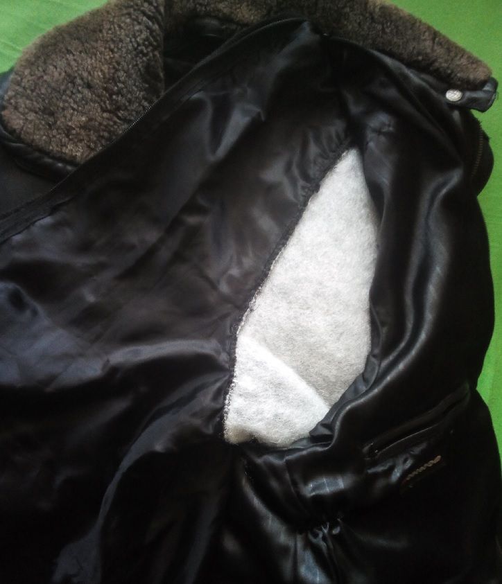 Inside of a leather jacket with an insulated sleeve