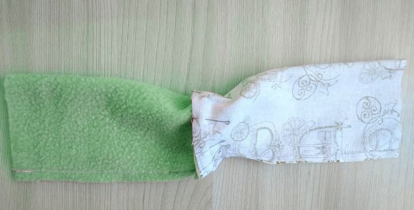 Joining the outer fabric and plush lining along the short edges