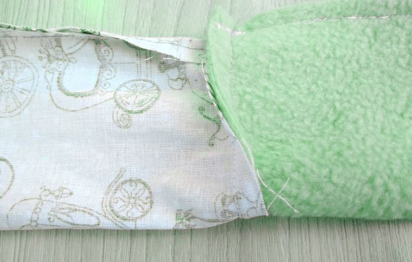 Close-up of the seam joining the outer fabric and plush lining