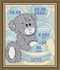 Cross-stitch birth sampler with a gray teddy bear, building blocks, and blue birth details