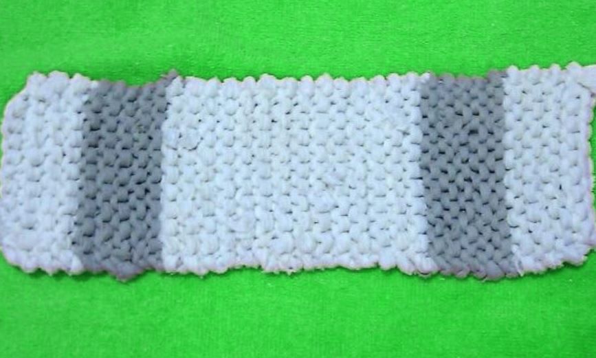 Long striped washcloth piece in garter stitch