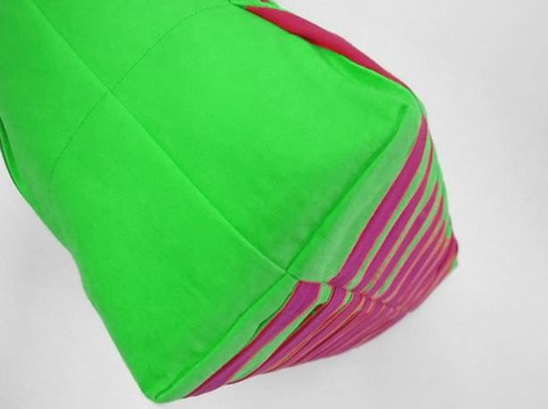 Bottom of a bright green summer bag