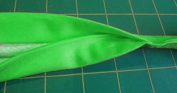 Knot on the handle of a bright summer bag