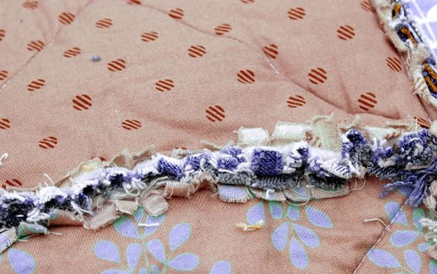 Fringe from unfinished seam allowances on a quilt seam