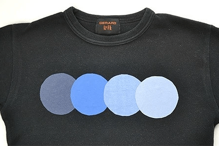 Appliqué pieces arranged on the front of a T-shirt