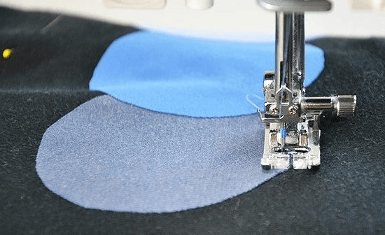 Sewing an appliqué piece onto a sewing machine