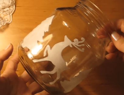 Applying stencils to the inside of the jar