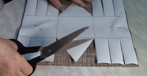 Pinning the paper pattern to the placemat