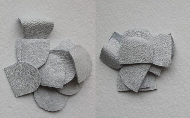 Cut petals from white leather for the winter brooch