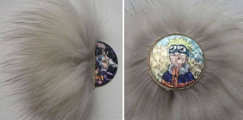 The brooch's fur base with a round decorative center