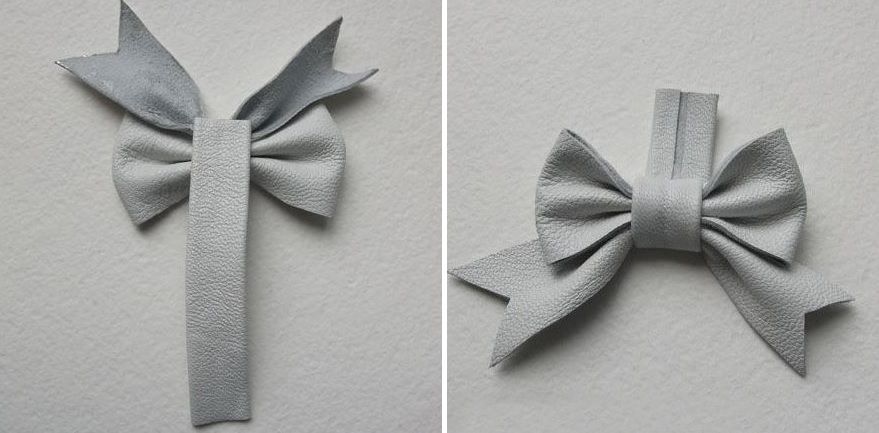Two bow variations made from white leather for the winter brooch