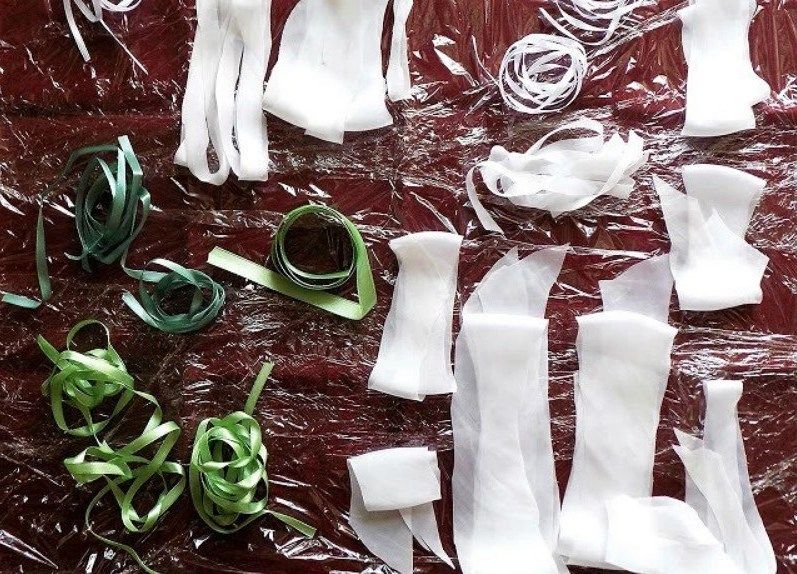 Ribbons laid out on plastic wrap