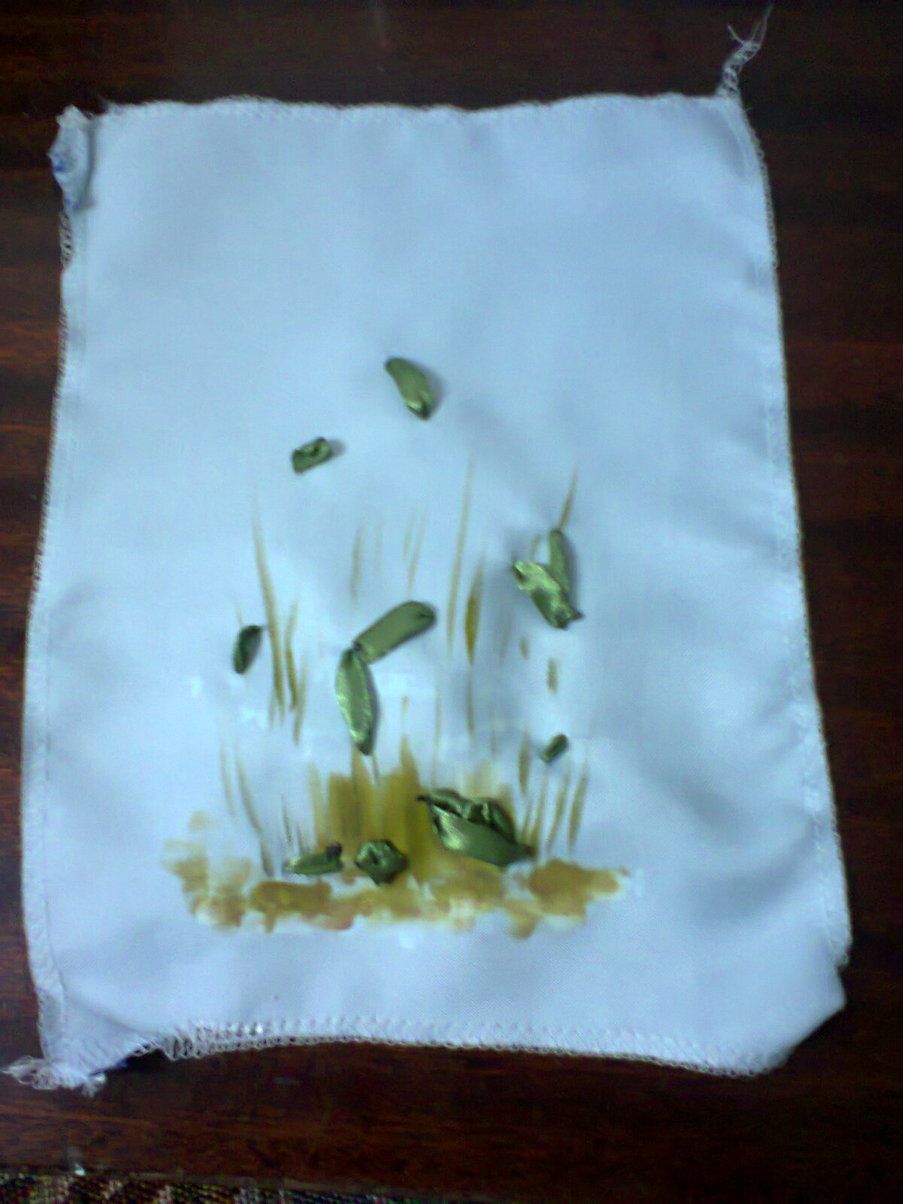 Wrong side of the ribbon embroidery after securing the ribbon