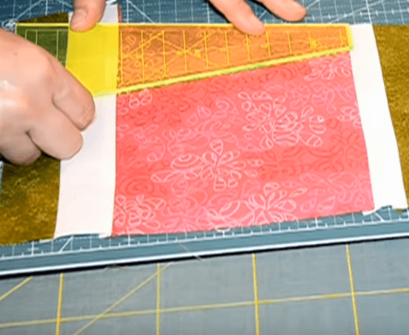 Marking a hot pad piece with a ruler