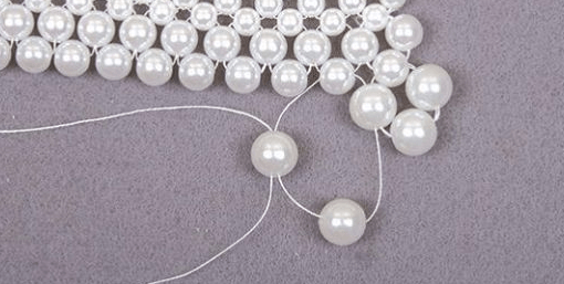 Joining the second row of beads in the pearl collar