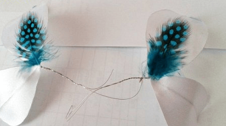 Butterfly with translucent wings held in a hand