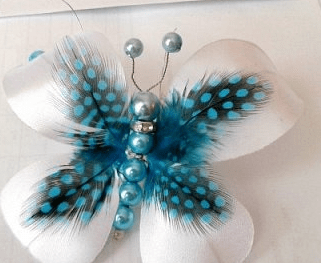Finished butterfly next to scissors