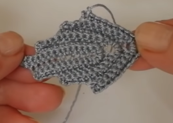 Gray textured leaf crocheted by hand