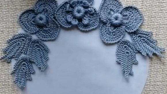 Gray Irish lace elements with textured leaves