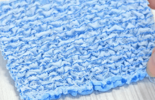 Rinsing the finished crinkled fabric