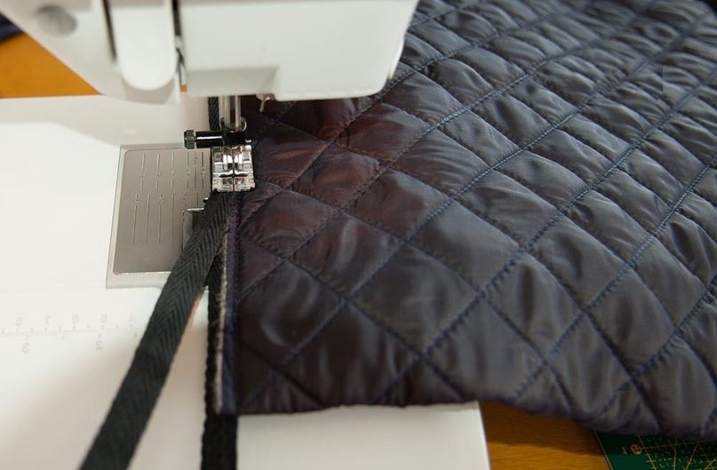 Stitching along a quilted tote-bag piece