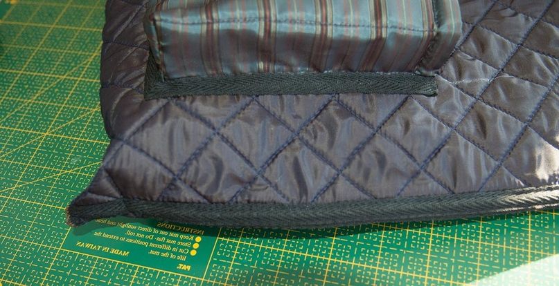 Zipper sewn into an interior bag pocket