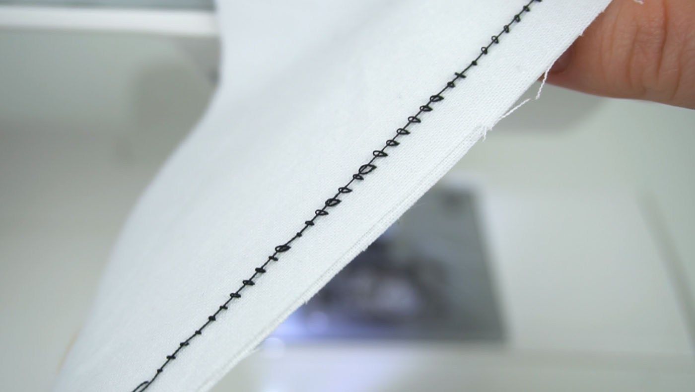 Sewing machine stitch showing thread looping