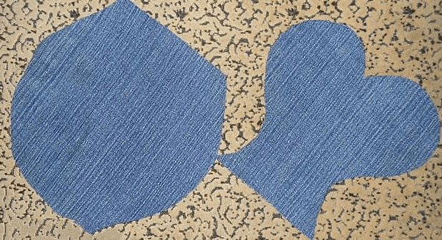 Cut denim pieces for the upper and lower parts of the apron