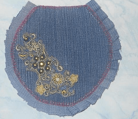 Lower apron edges finished with a blanket stitch