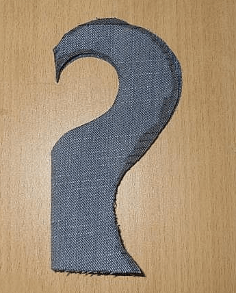 Heart-shaped denim upper apron piece with blanket-stitched edges