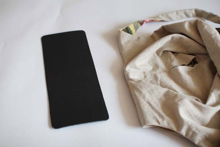 Bag beside a smartphone for scale