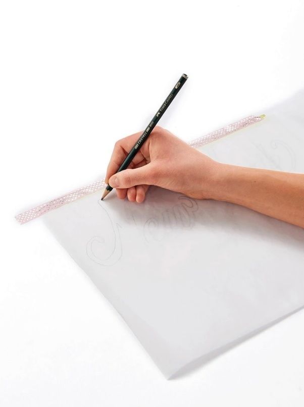 Tracing letters onto parchment paper
