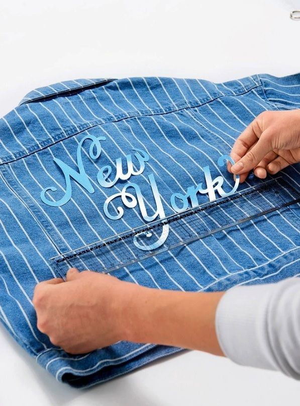 Marking placement on the shirt with a fabric marker