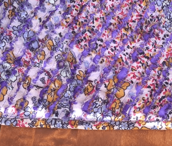 Textured surface of the scarf in the double-sided chenille technique