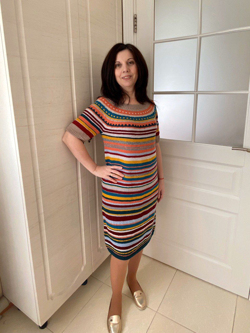 Knitted dress made from yarn scraps
