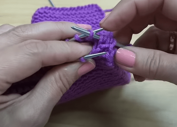 Transferring stitches onto a double-pointed needle for a no-sew heel