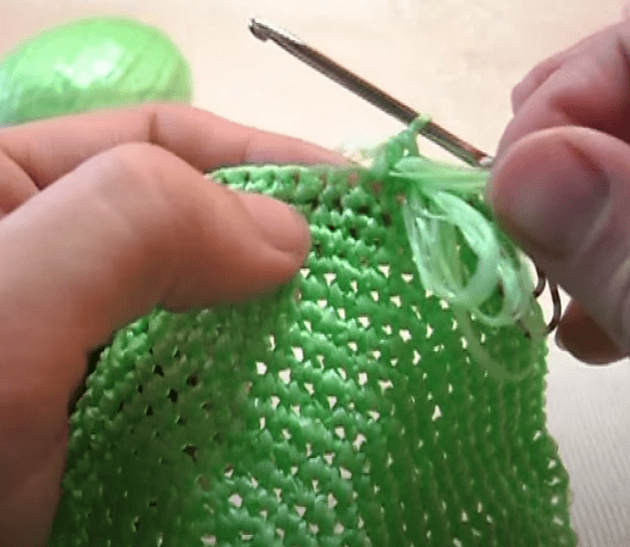 Beginning to crochet elongated loops on the washcloth