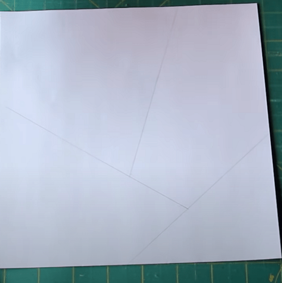 Fabric square marked with diagonal lines for the mosaic