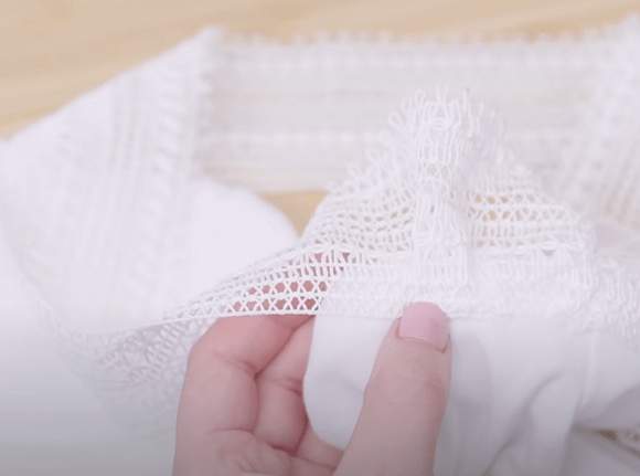 Sewing lace onto the sleeve