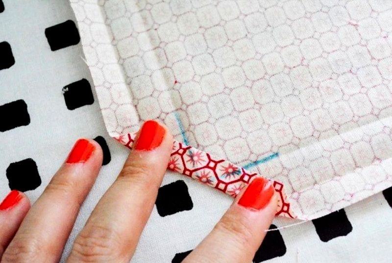 A marked fabric corner with a folded edge