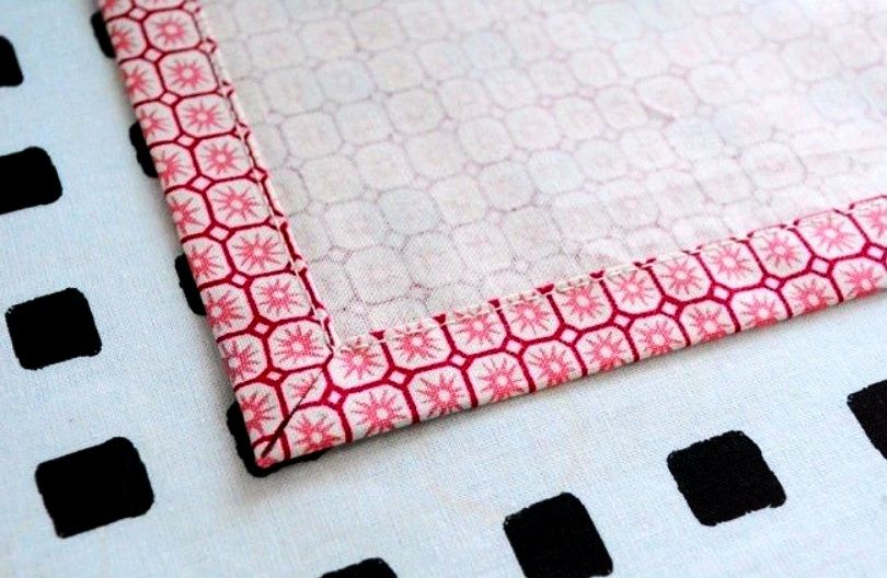 A finished fabric corner with a neat hem