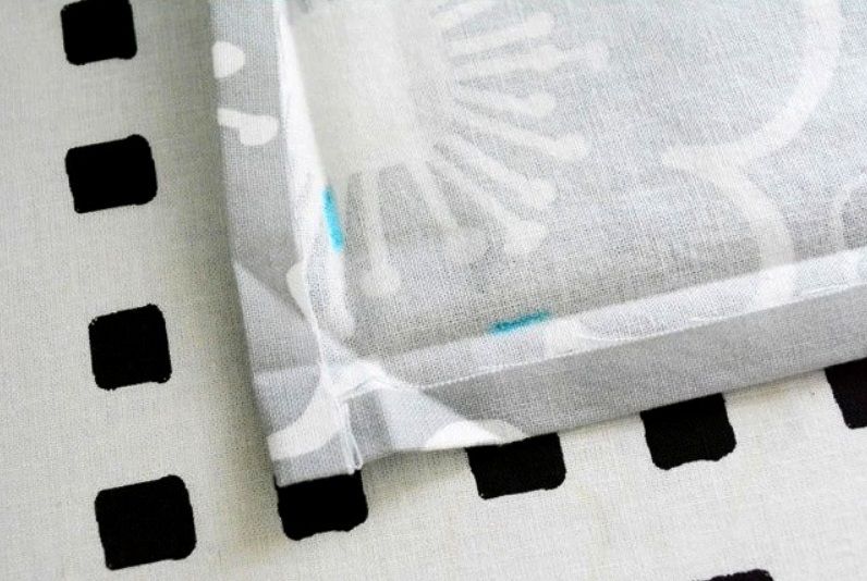 A folded fabric corner after hemming