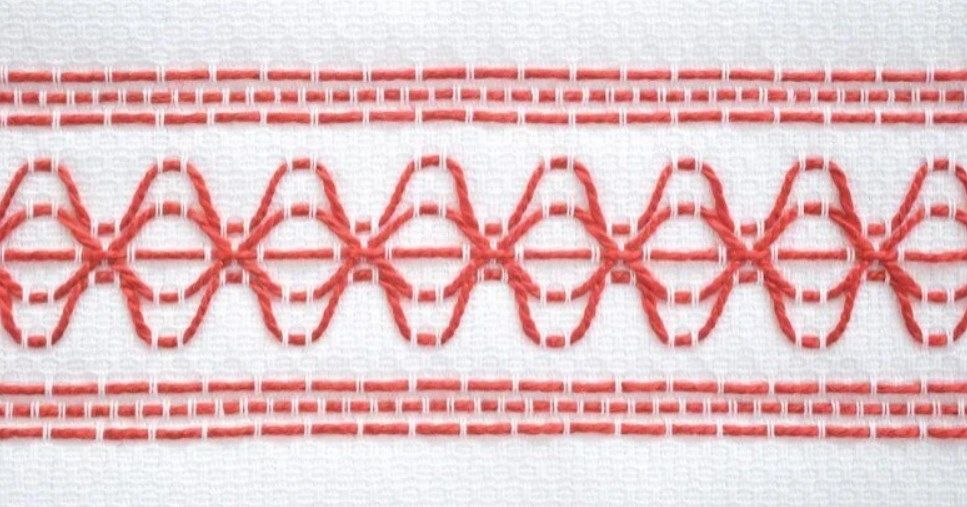 Sample of a red Swedish embroidery ornament