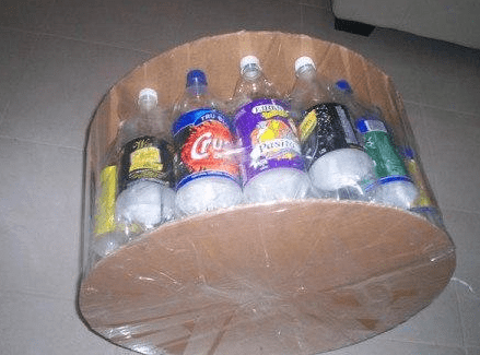 Cardboard circles attached to the bottle base