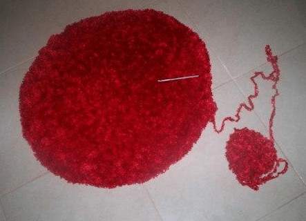 Finished pouf with decorative cover