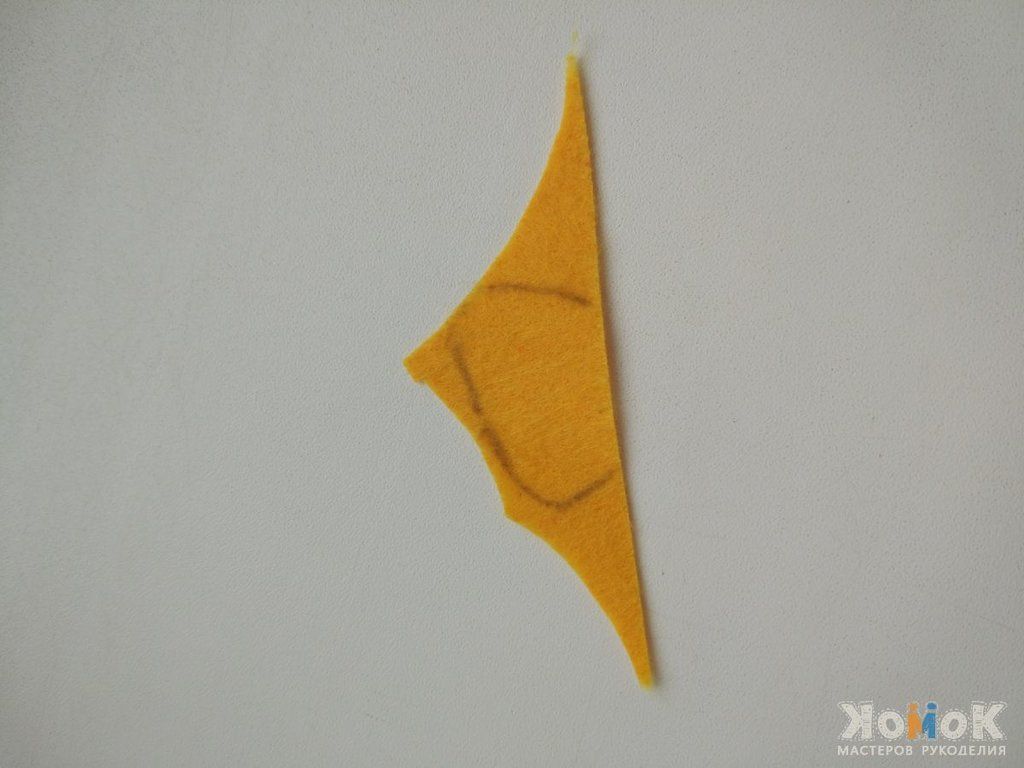 Folded yellow appliqué piece for the number