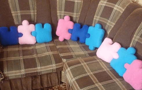 Finished soft puzzle mat on a sofa