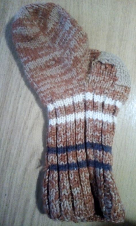 A sock with a knitted patch on the heel