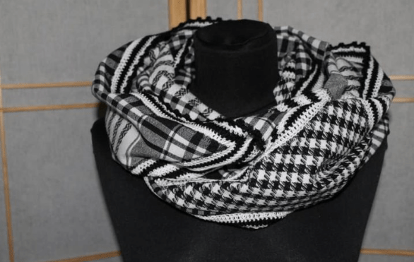 Infinity scarf made from a plaid scarf on a mannequin