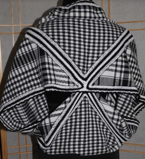 Wrap made from a plaid scarf on a mannequin, back view